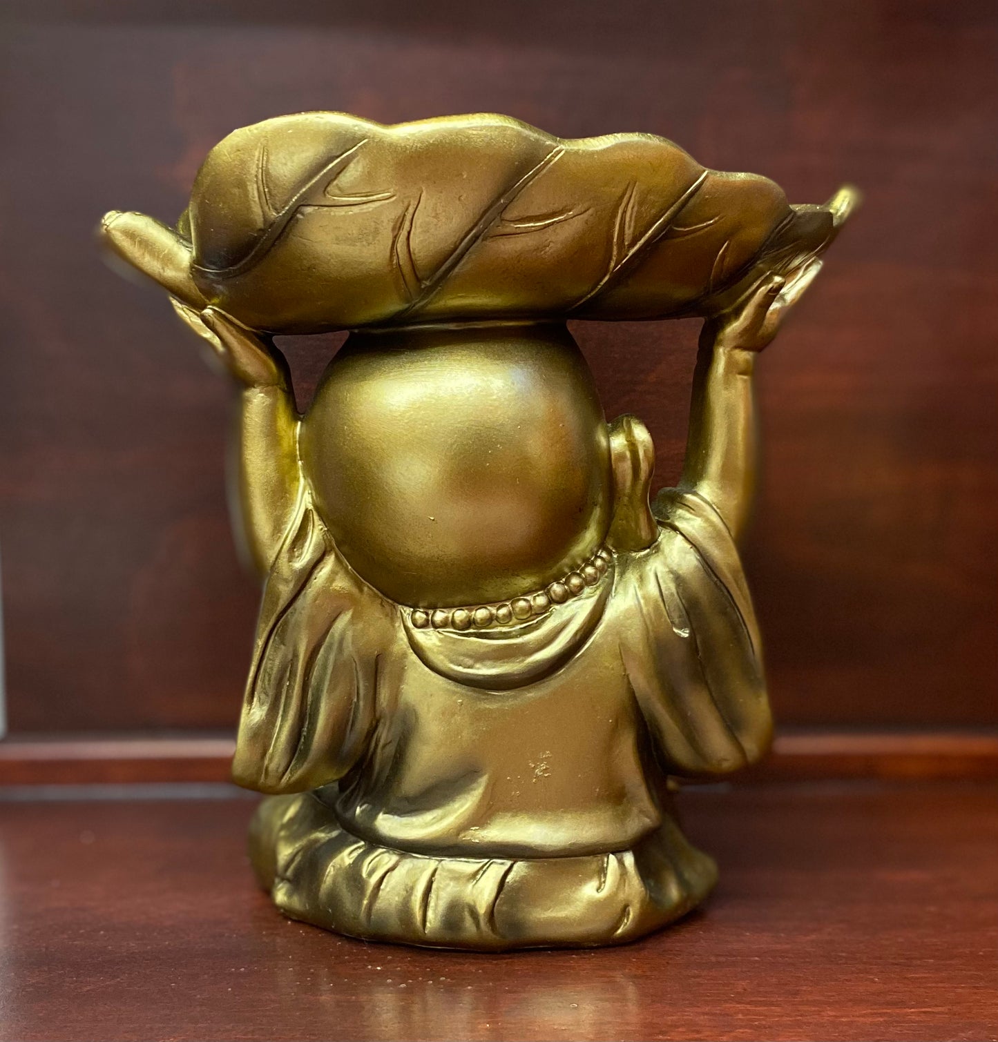 Gold Baby Buddha with Leaf Statue